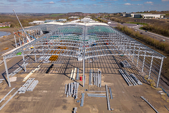 UAV drone photo steel framed warehouse under construction