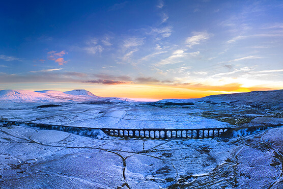 drone winter's view of the yorkshire dales for tourist website 